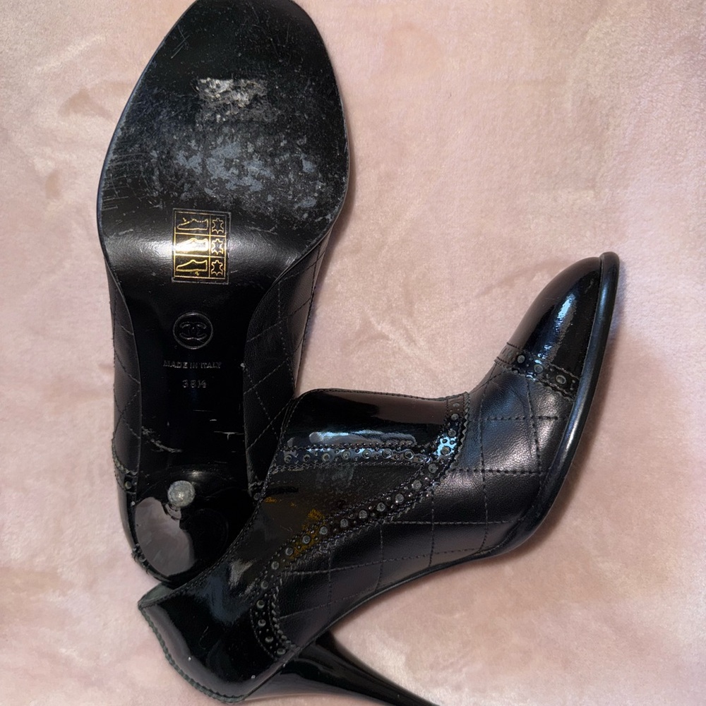 CHANEL Black Quilted Heeled Boots